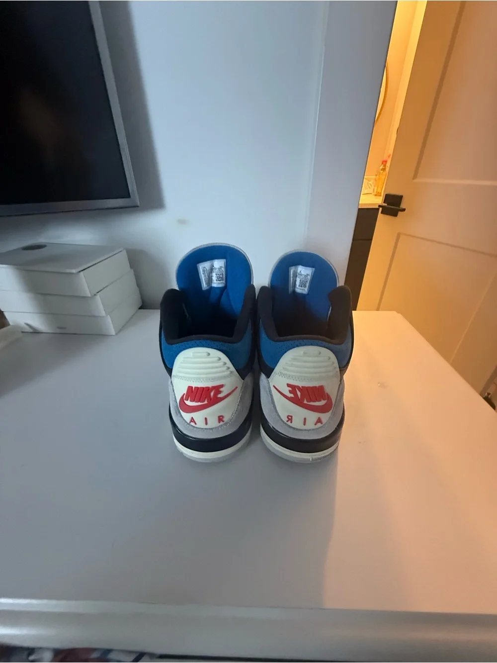 Jordan Retro Black and White Men’s Sneakers with Blue Accent